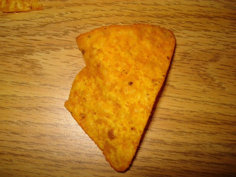single tortilla chip on table
