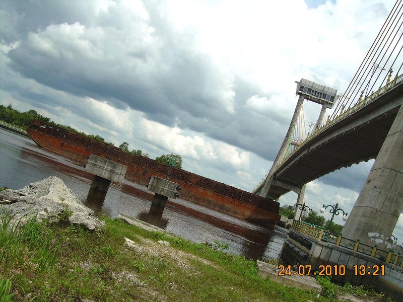 Sinking Barge under Bridge