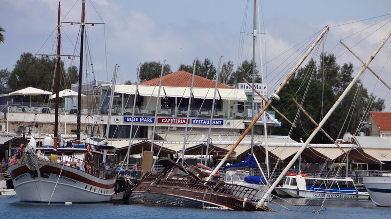 Sinking Boat in Harbor