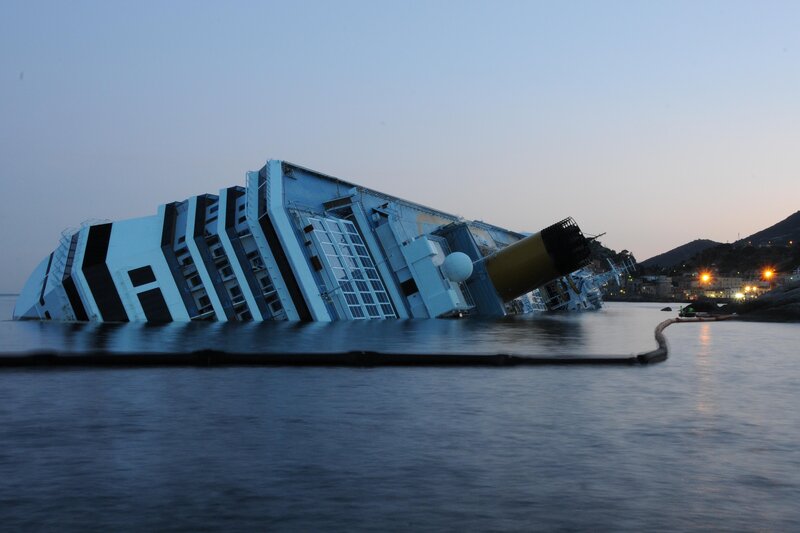Sinking cruise ship at dusk