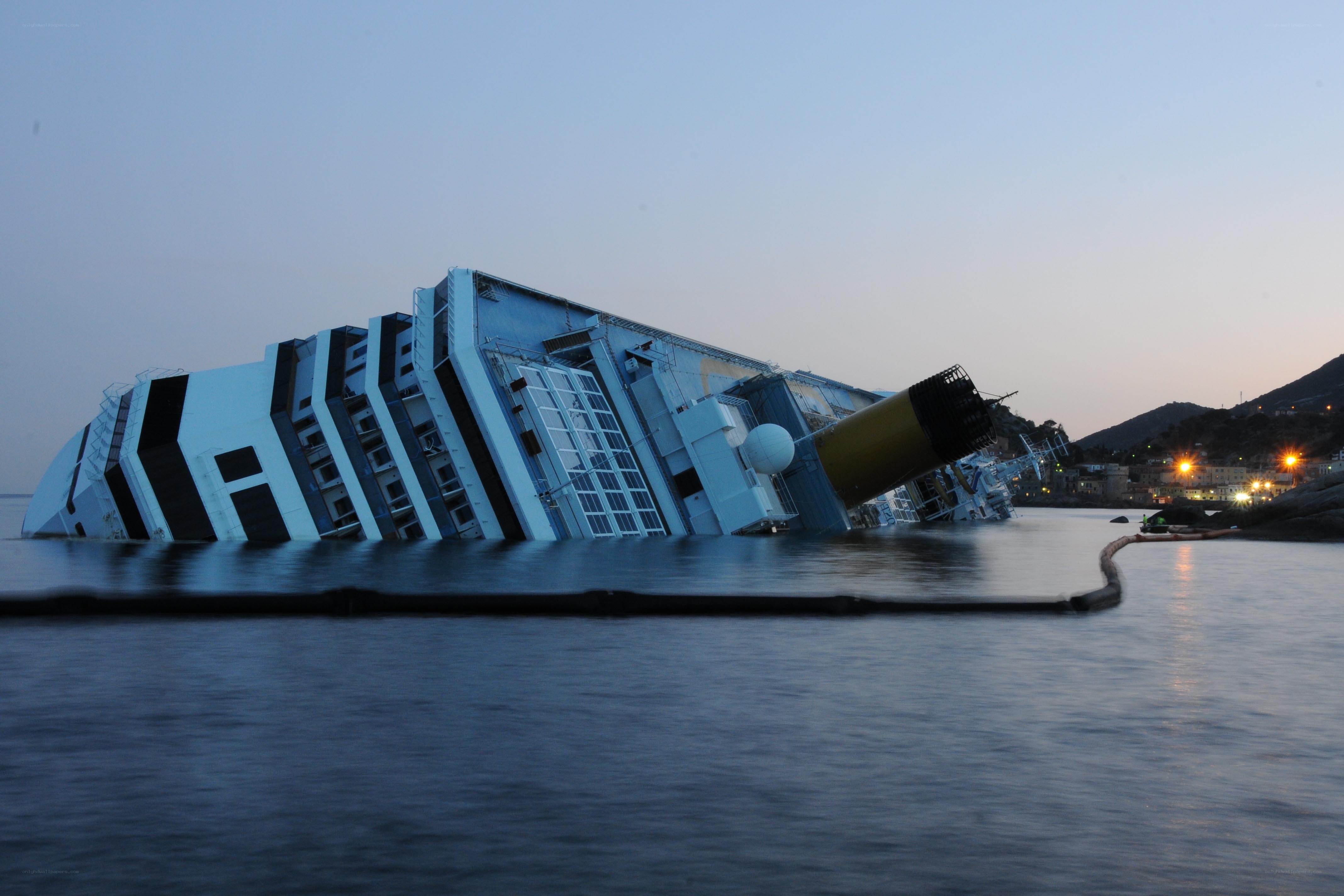 Sinking cruise ship at dusk