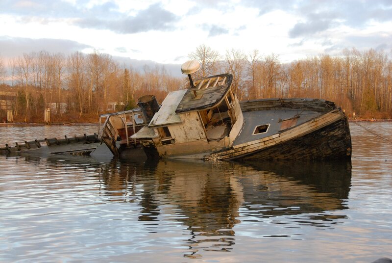 Sinking ship in a river