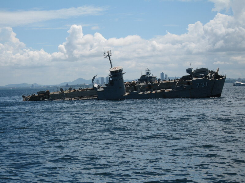 Sinking ship in harbor