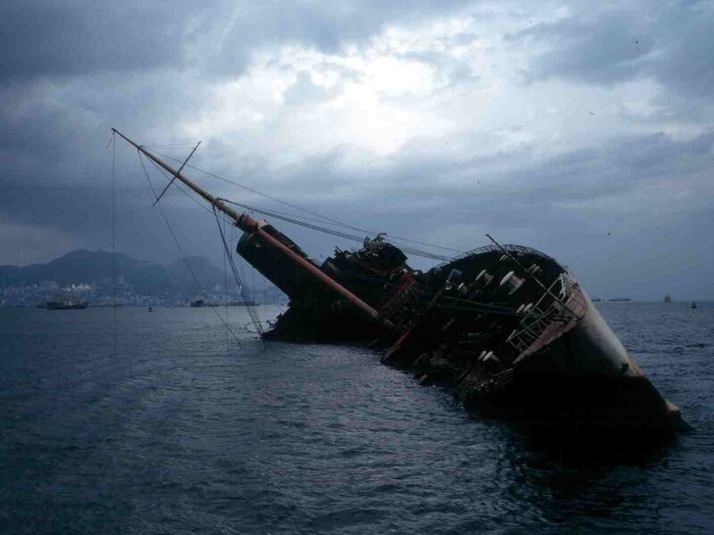 Sinking ship in harbor