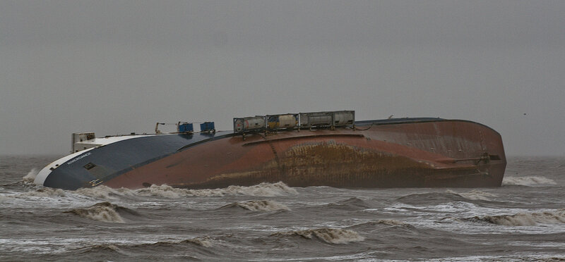 Sinking ship in rough seas