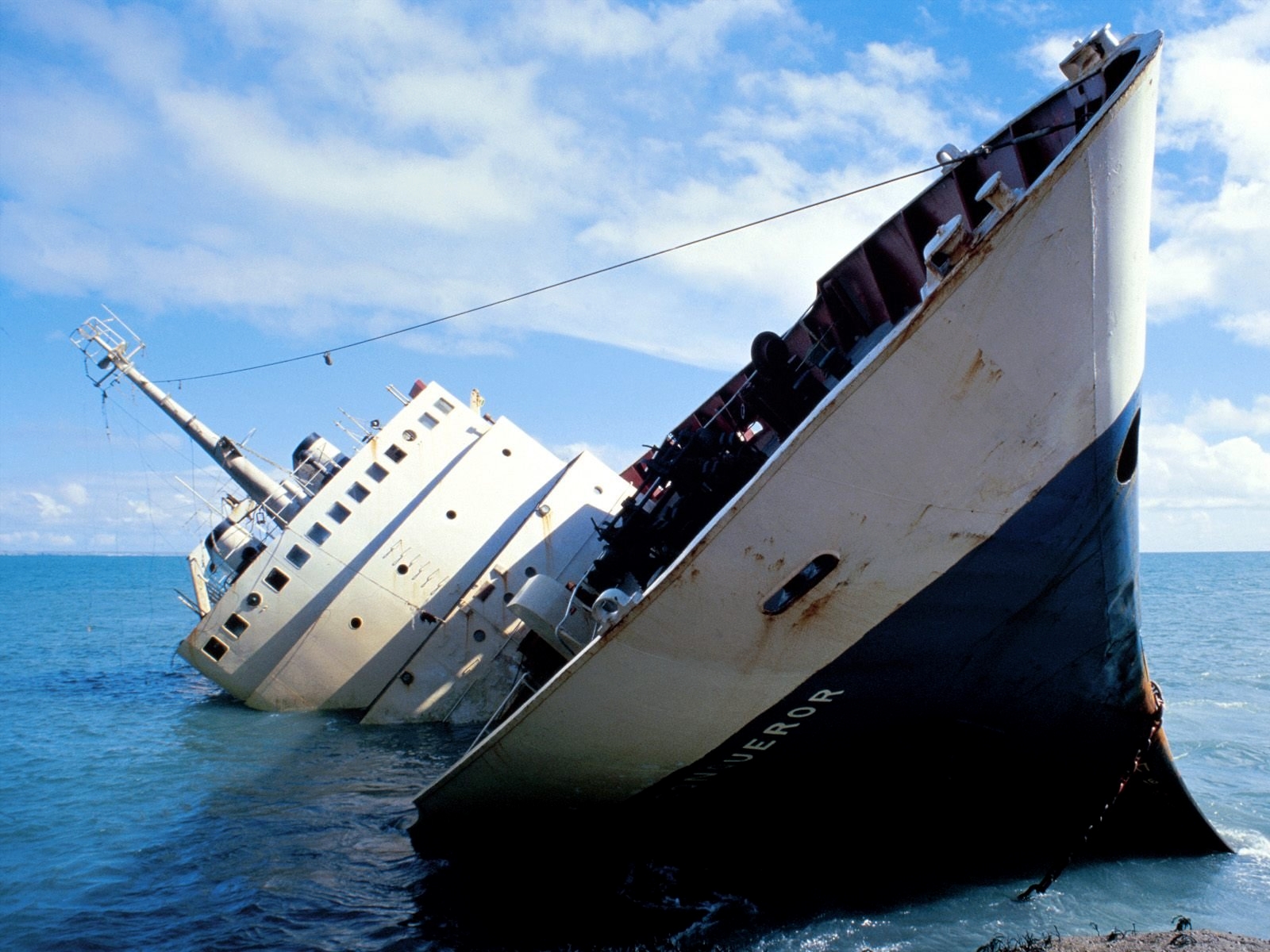 Sinking ship on the ocean