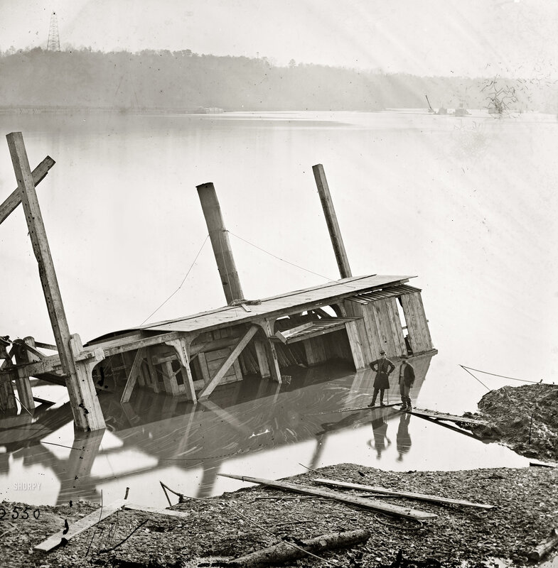 Sinking wooden structure on river