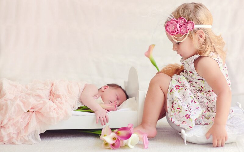 Sister Watching Baby