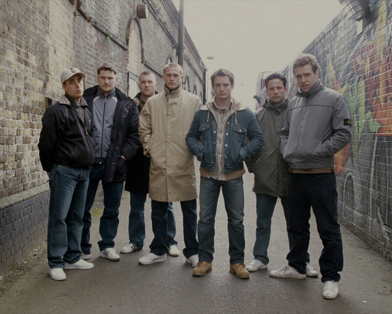 six men in an alleyway