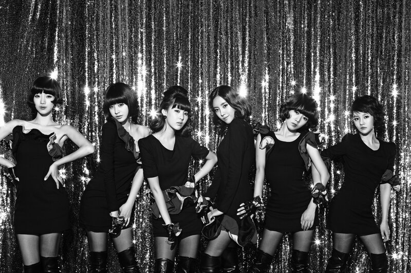 six women in black dresses