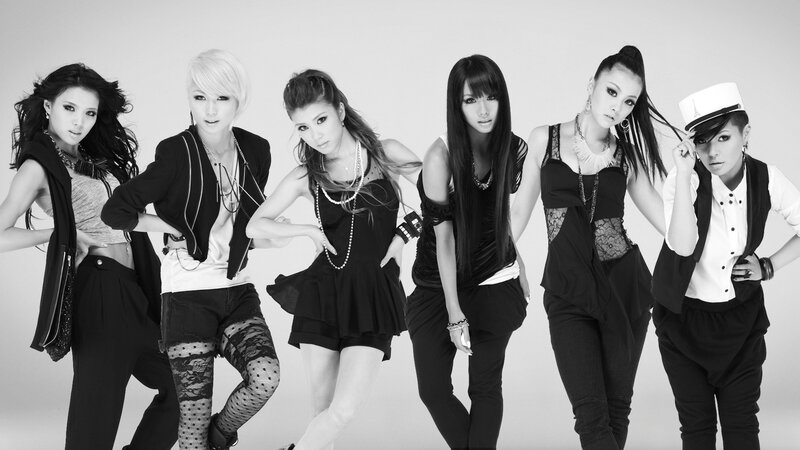 six women posing in black and white