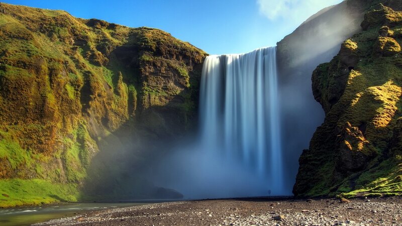 Skógafoss Waterfall — Blue, Dramatic, Afternoon, Photograph, Cliffs