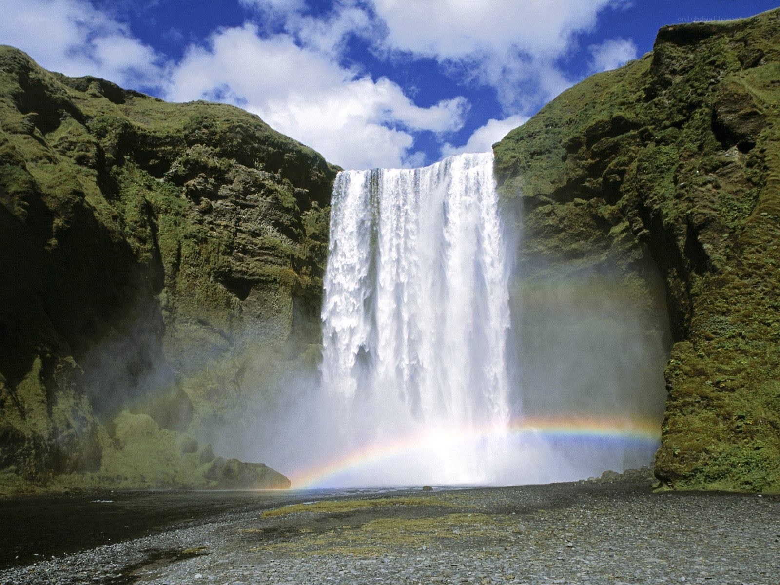 Skógafoss waterfall with rainbow