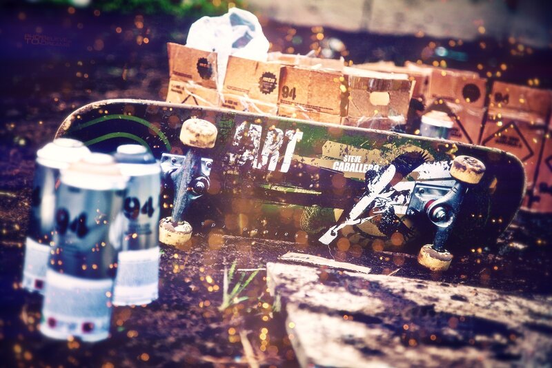Skateboard and spray cans