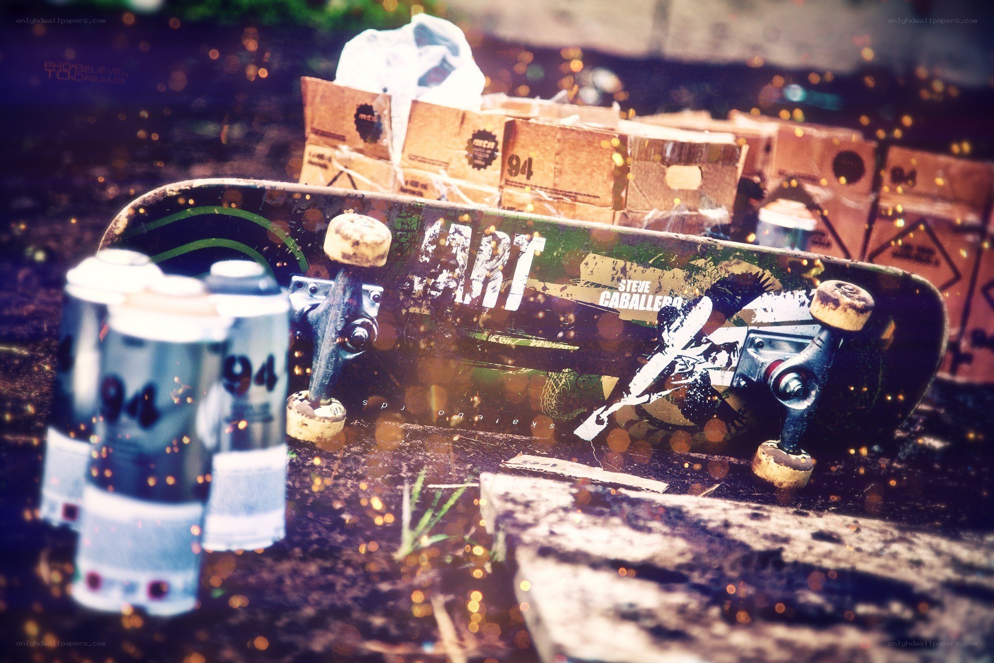 Skateboard and spray cans