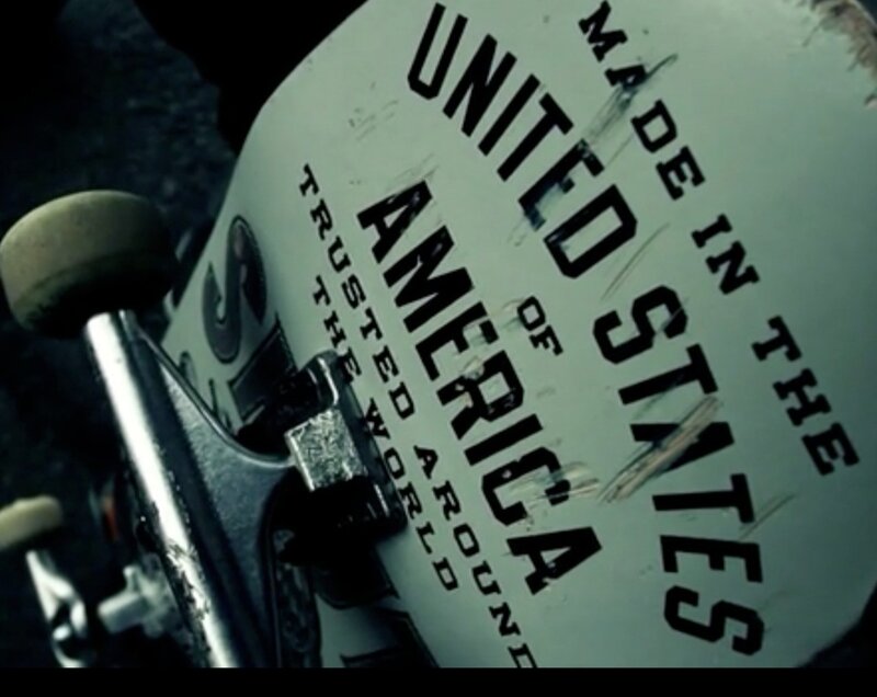 skateboard deck with text