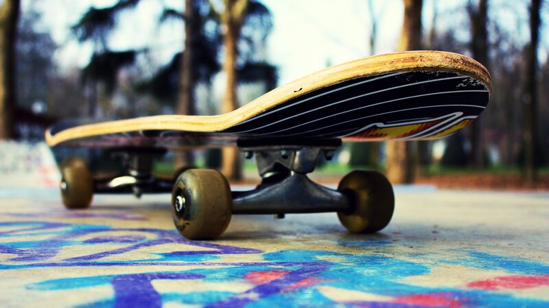 skateboard on graffiti ground