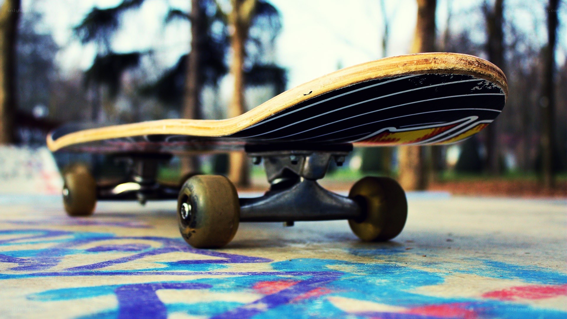 skateboard on graffiti ground