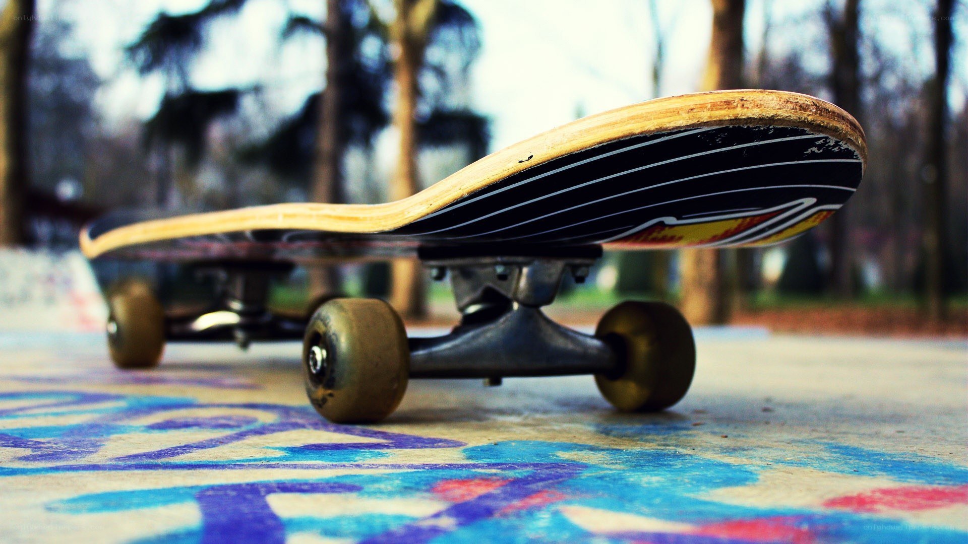skateboard on graffiti ground