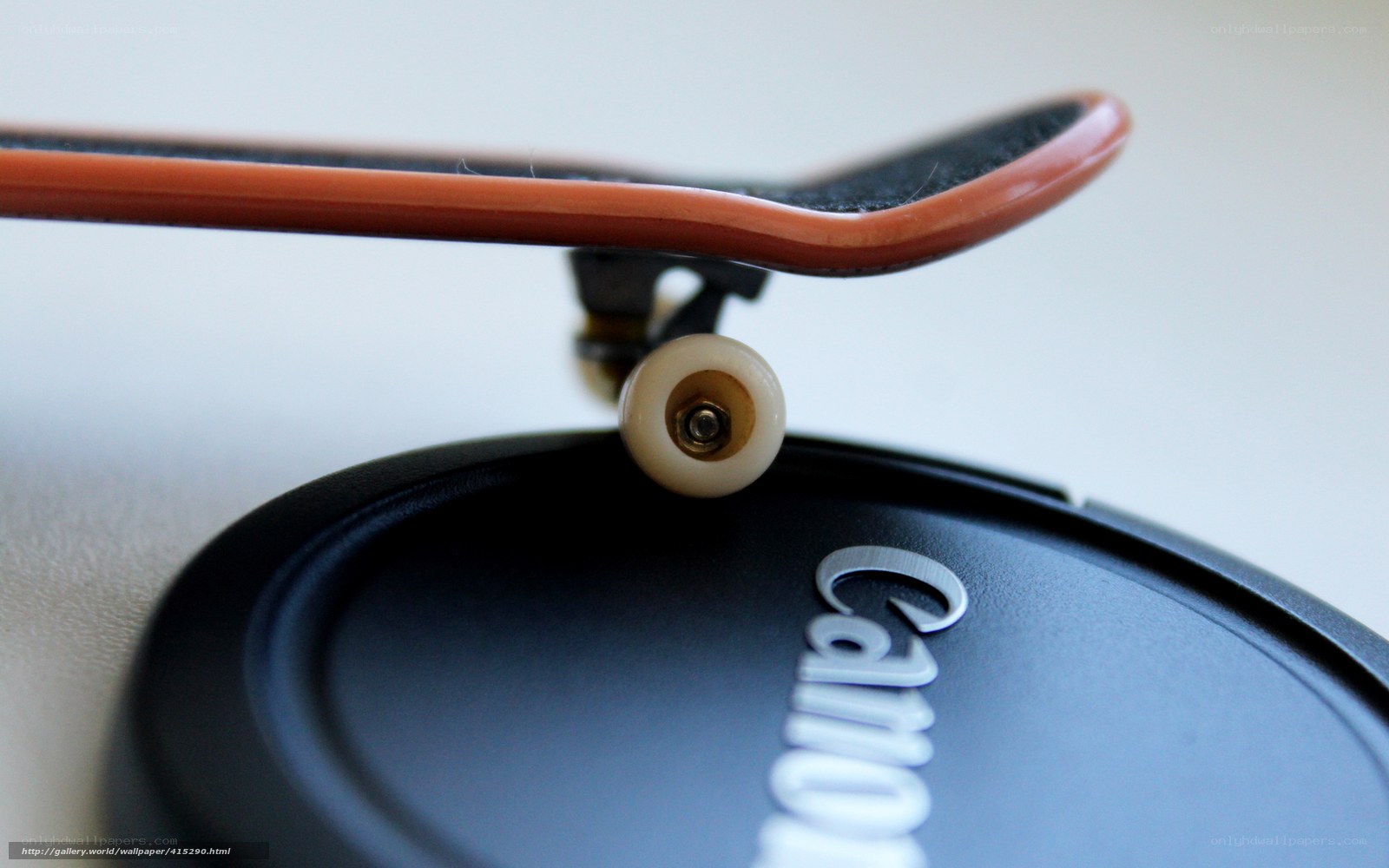 skateboard on lens cap