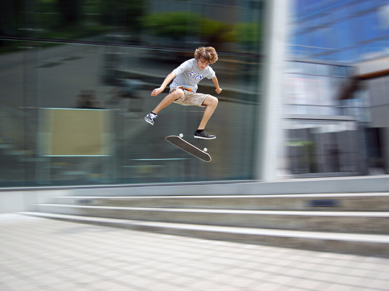 Skateboarder in Mid-air — Gray