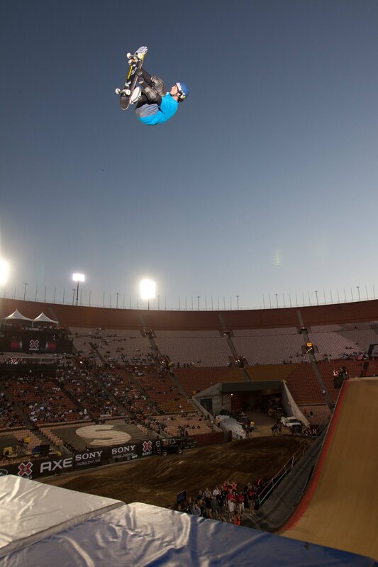 Skateboarder in mid-air trick