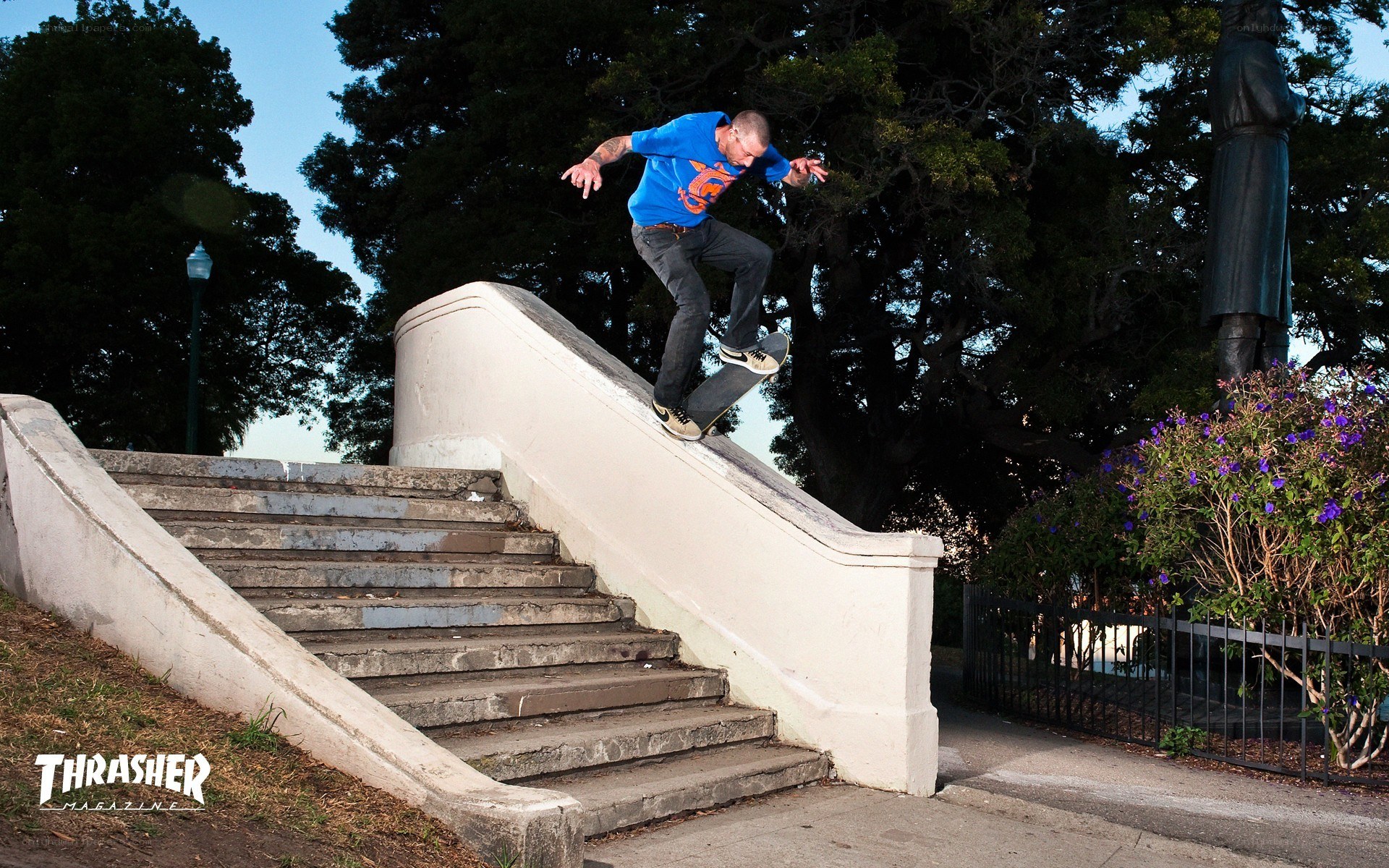 skater grinding down stairs