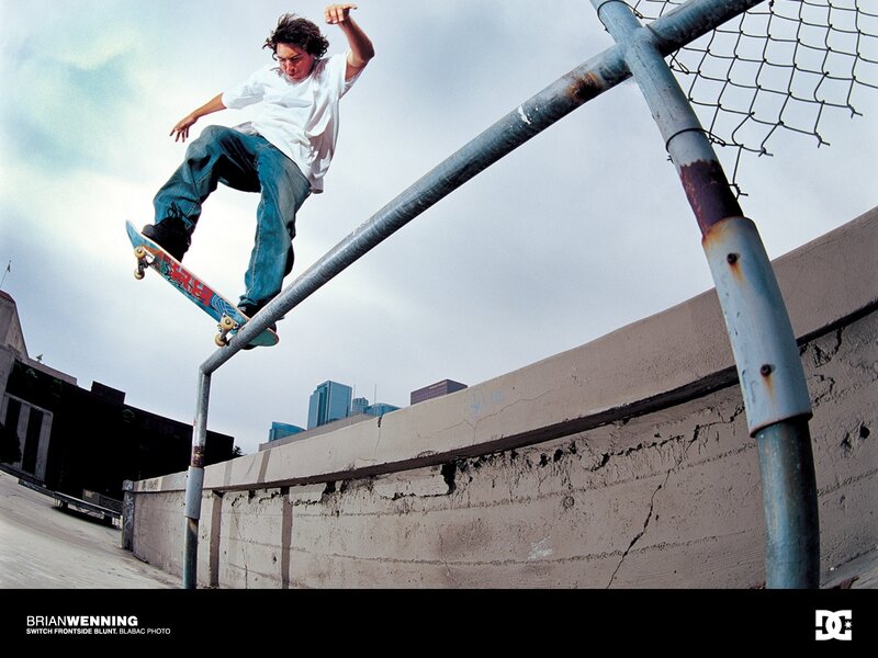 skater grinding on rail