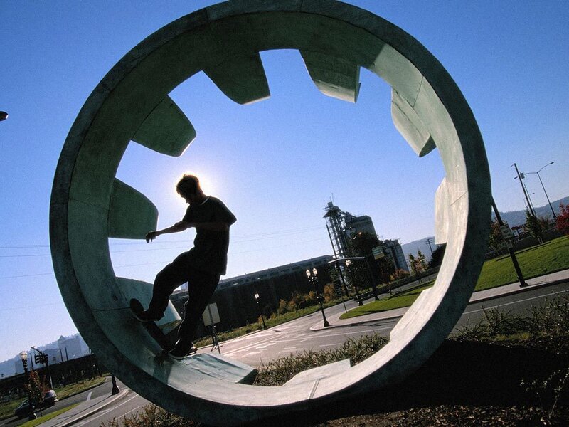 Skater in a gear sculpture