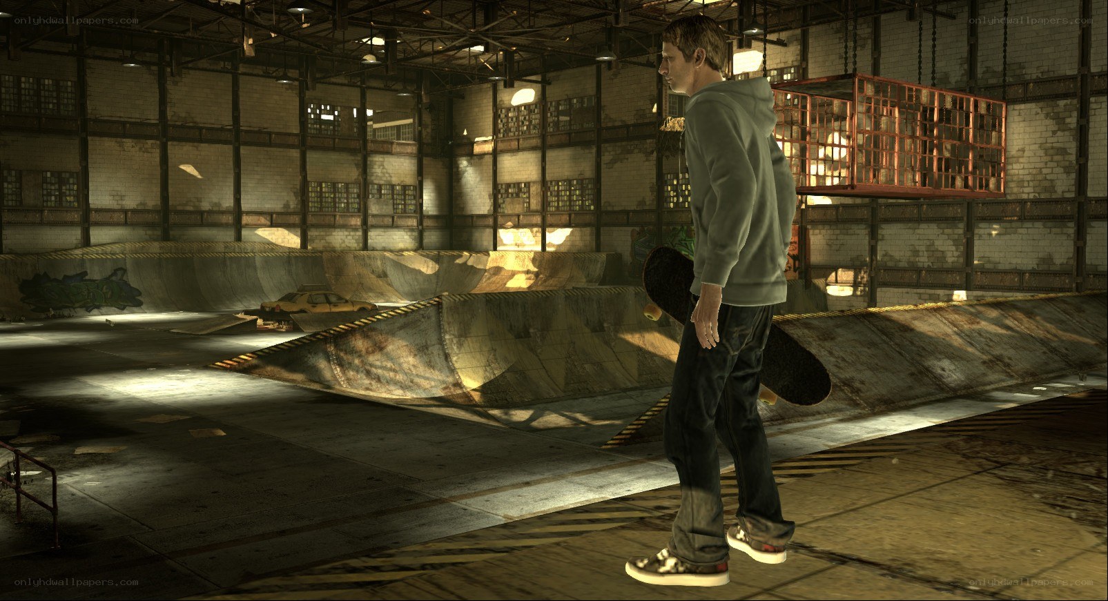 skater in abandoned warehouse