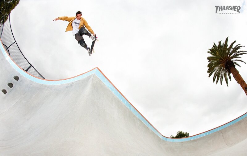 skater in mid-air at skatepark