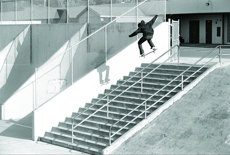 skater jumping down stairs