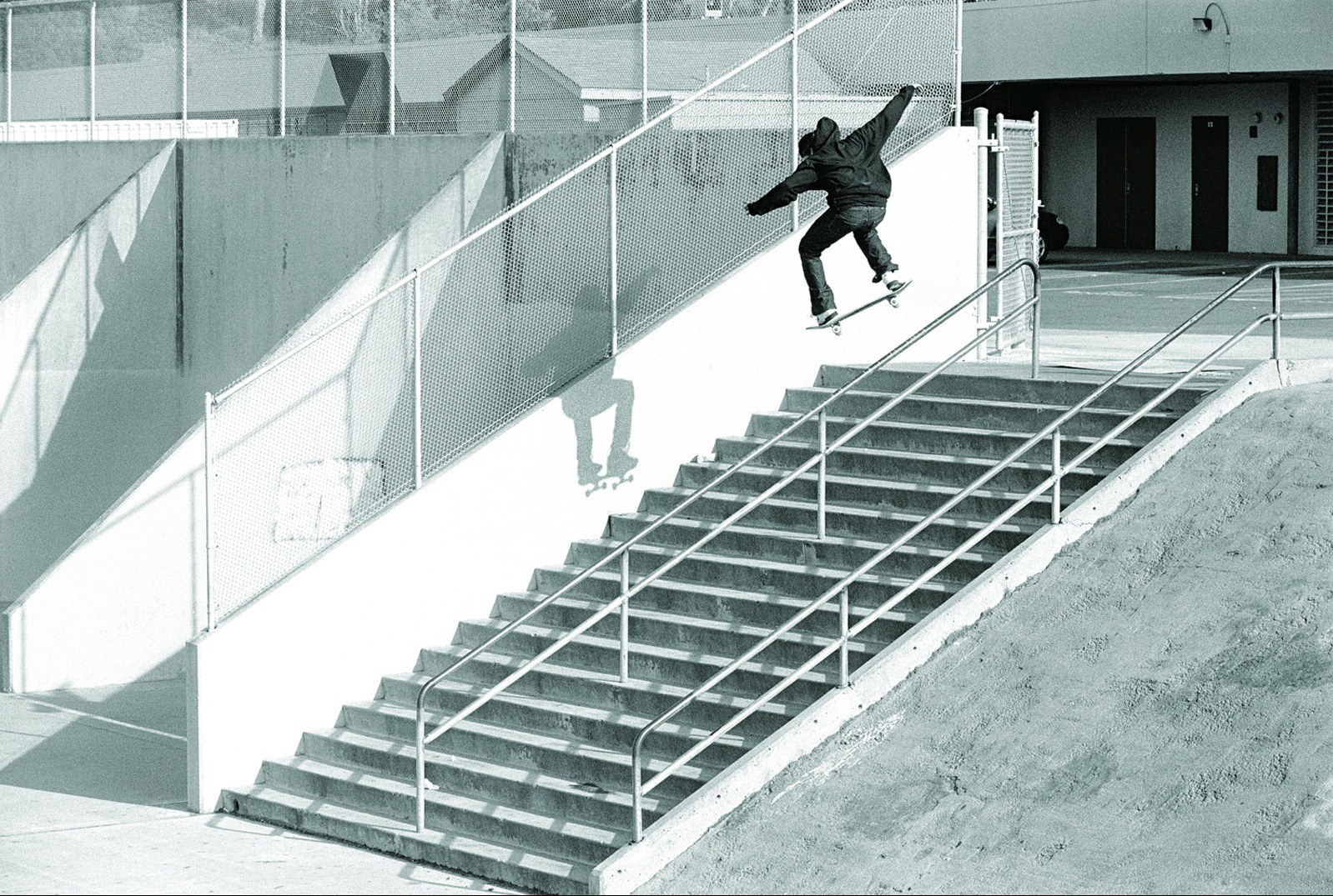 skater jumping down stairs