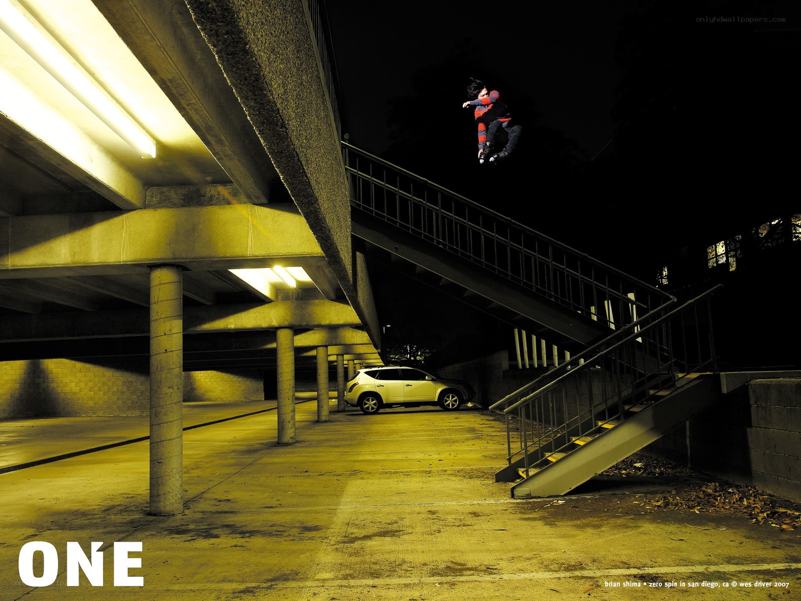 Skater mid-air at night