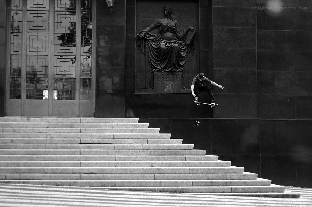 Skater mid-air on steps
