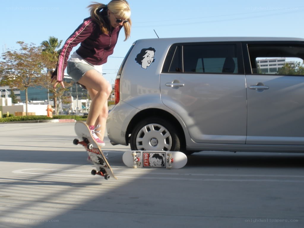 Skater near a car