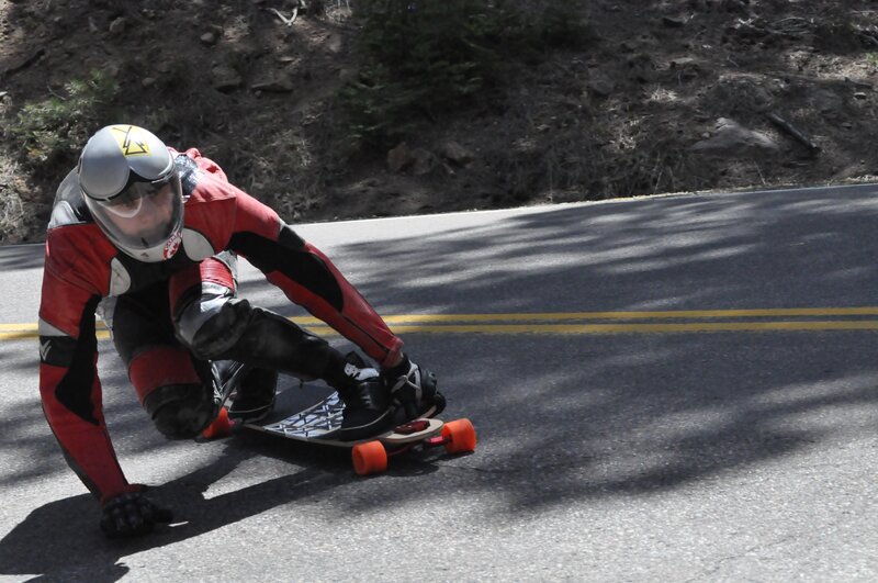 Skater on a downhill road