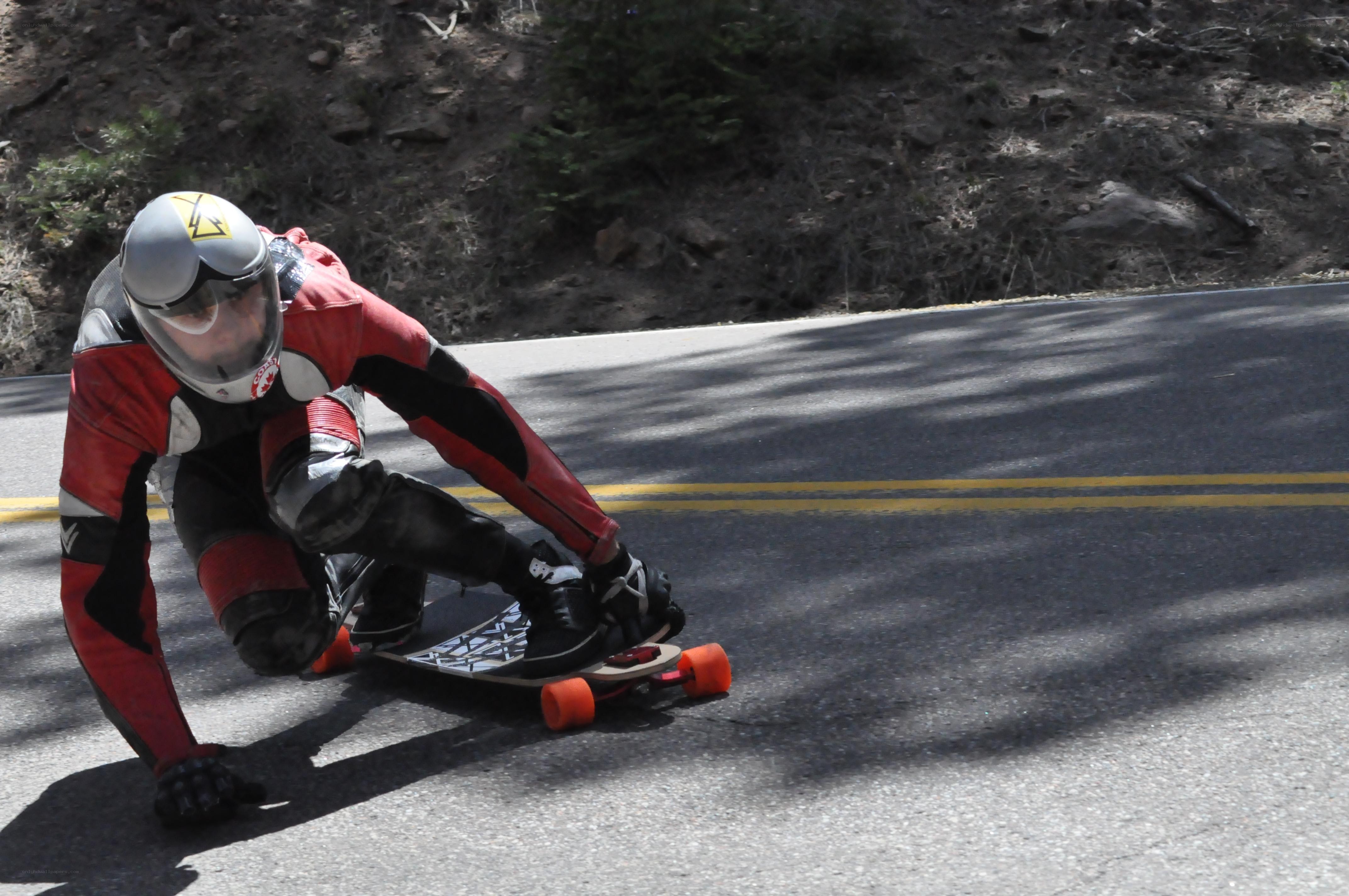Skater on a downhill road