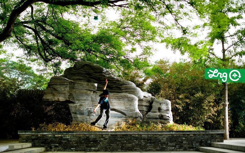 Skater on a ledge in a park