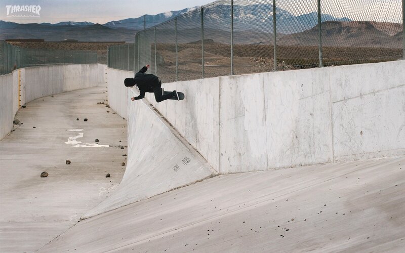 Skater on concrete ramp