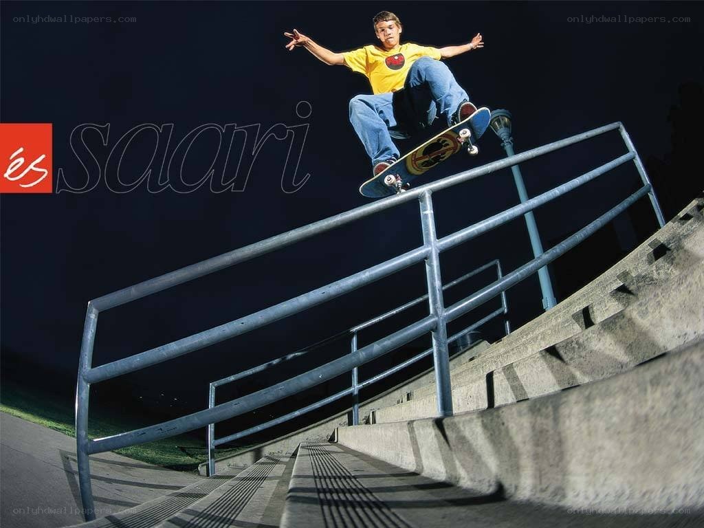 Skater on rail at night