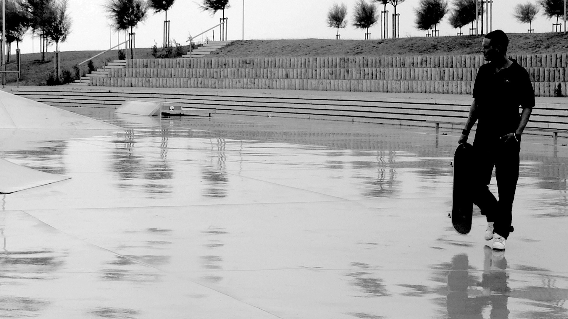 skater on wet pavement
