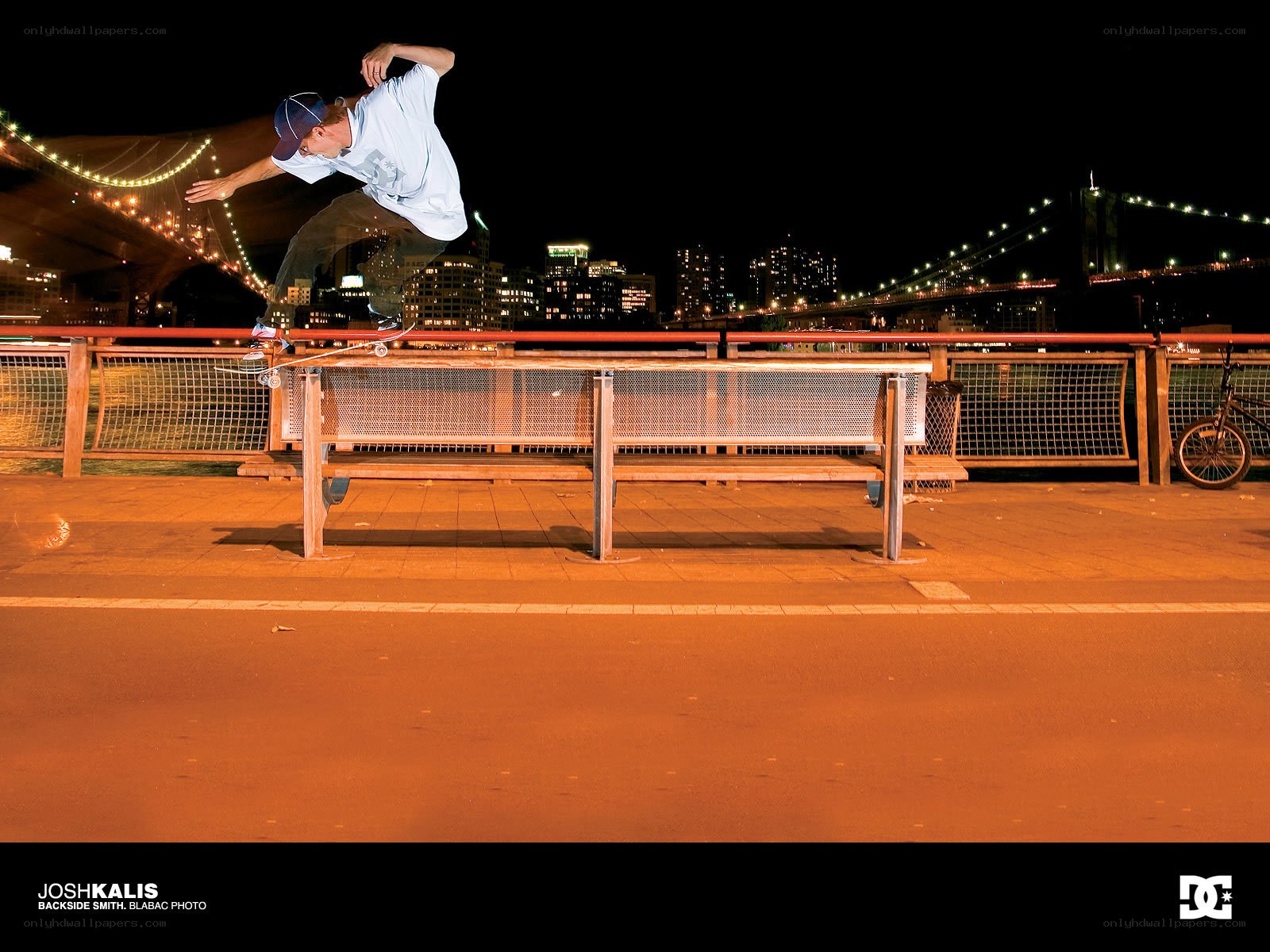 Skater performing trick at night