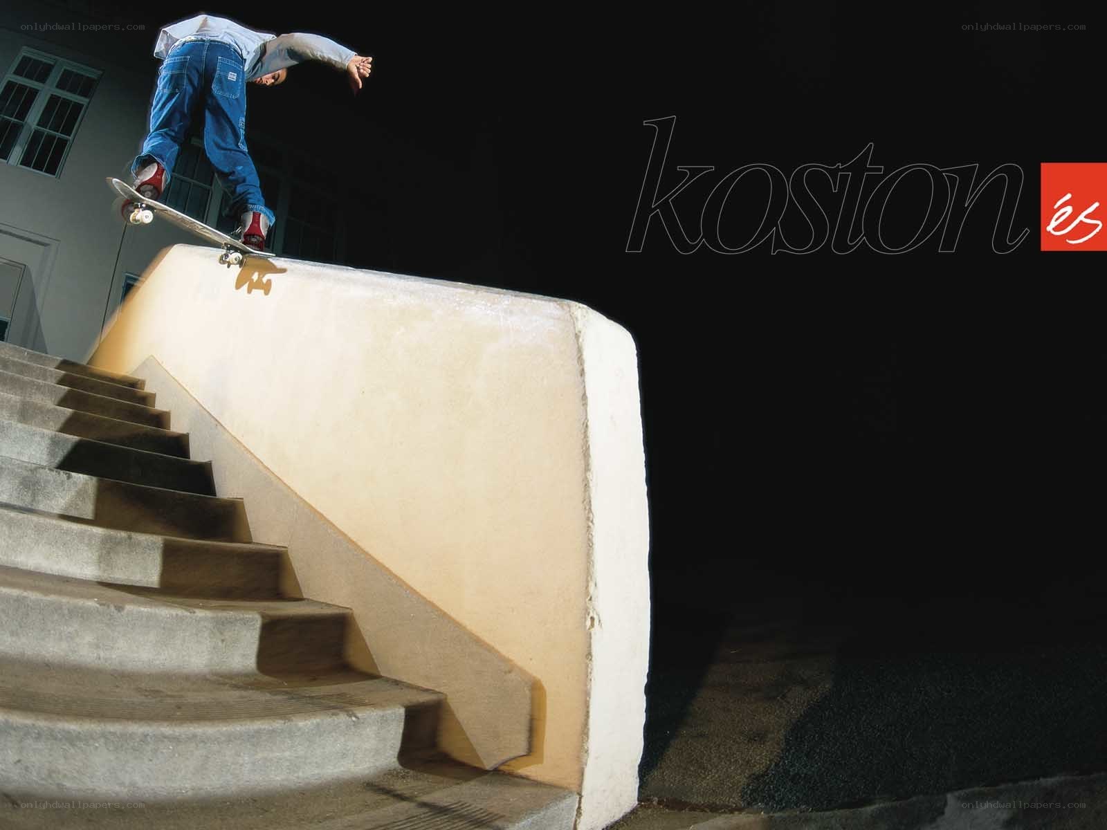 skater performing trick at night
