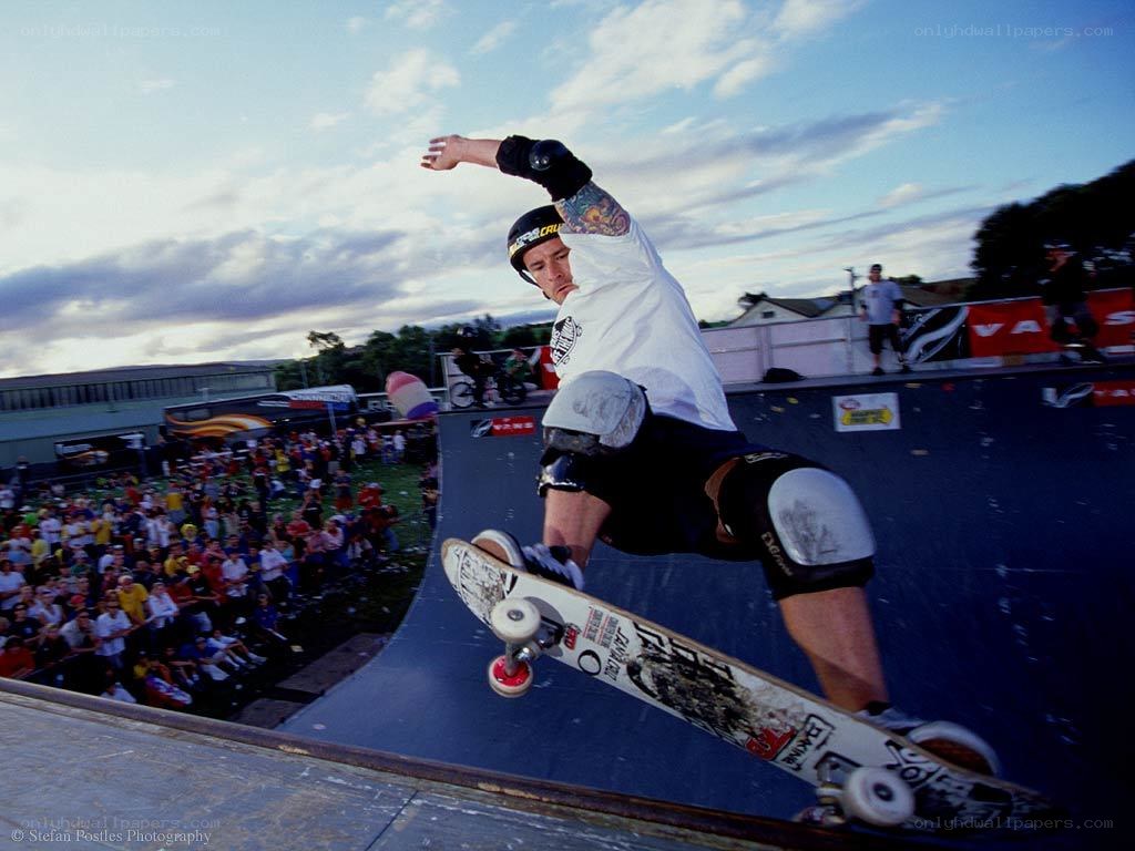Skater performing trick at ramp