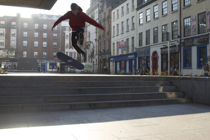 Skater Performing Trick — Gray, Active