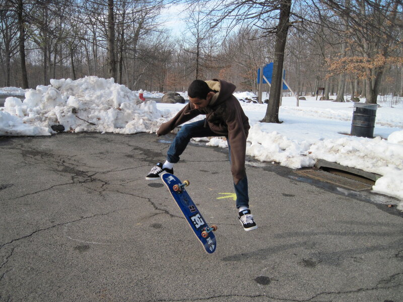 Skater Performing Trick — Gray, Active, Winter