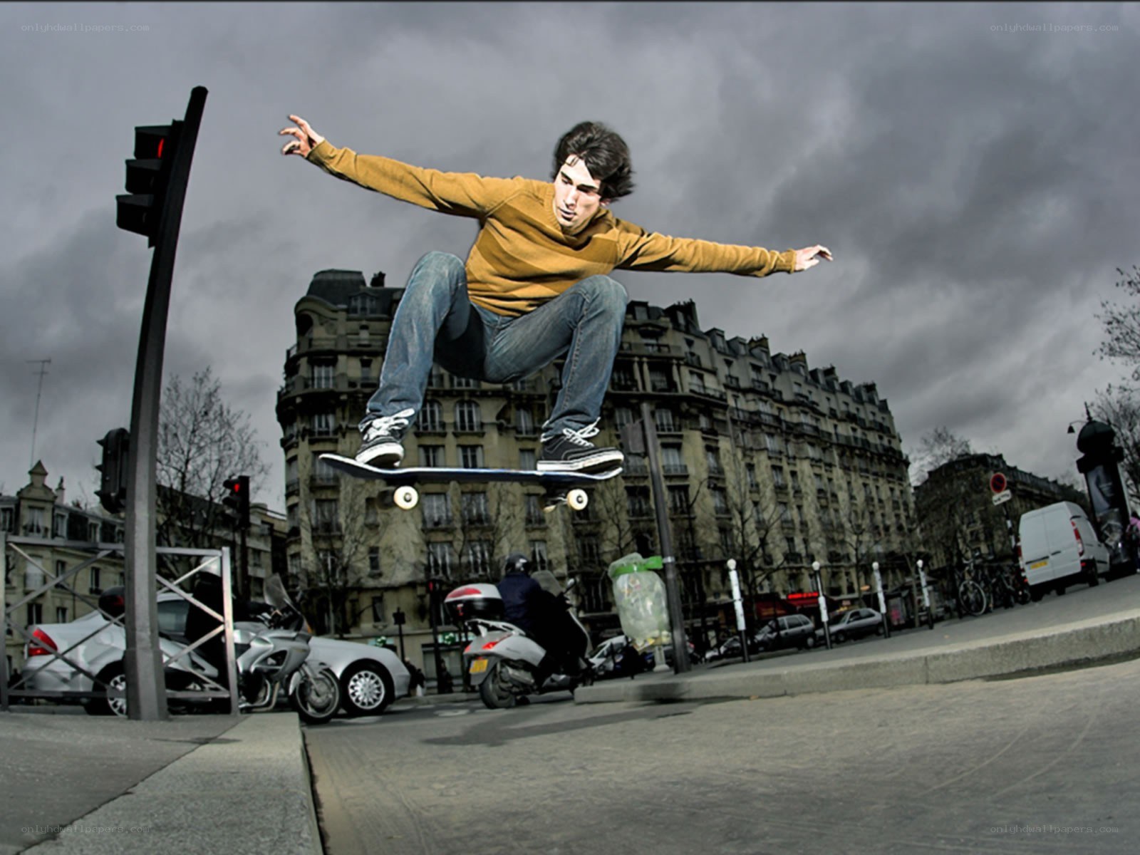 Skater performing trick in city