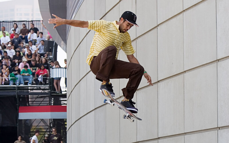 Skater performing trick on ramp