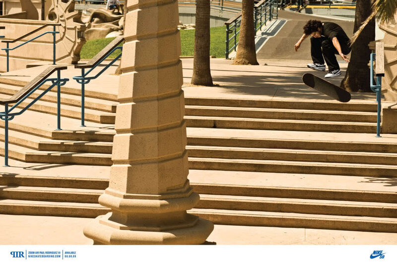 skater performing trick on stairs